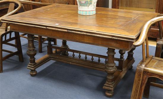 A 17th century style French design walnut extending dining table W.292cm fully extended
